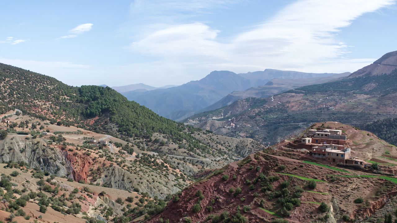 Mountain valley with a village on a ridge in Morocco's Atlas range near Marrakech
