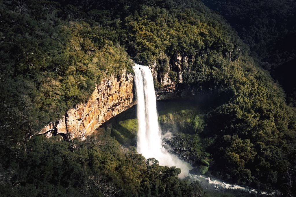 Aerial view of Caracol Falls dropping into forest near Canela, Rio Grande do Sul, Brazil