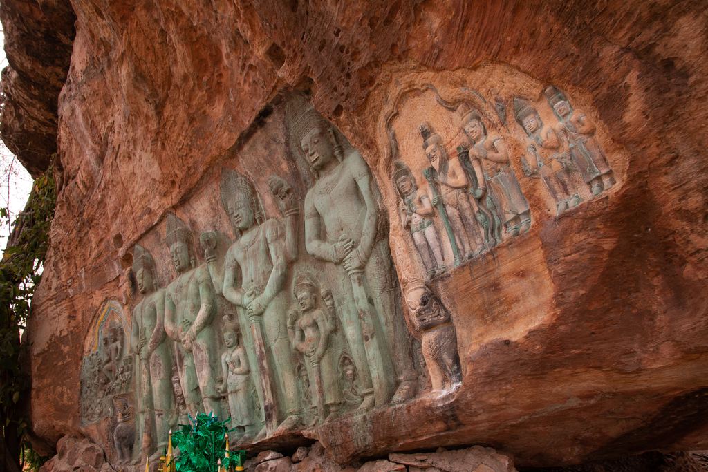 Carved figures on a sandstone rock face in Phnom Kulen National Park, Cambodia