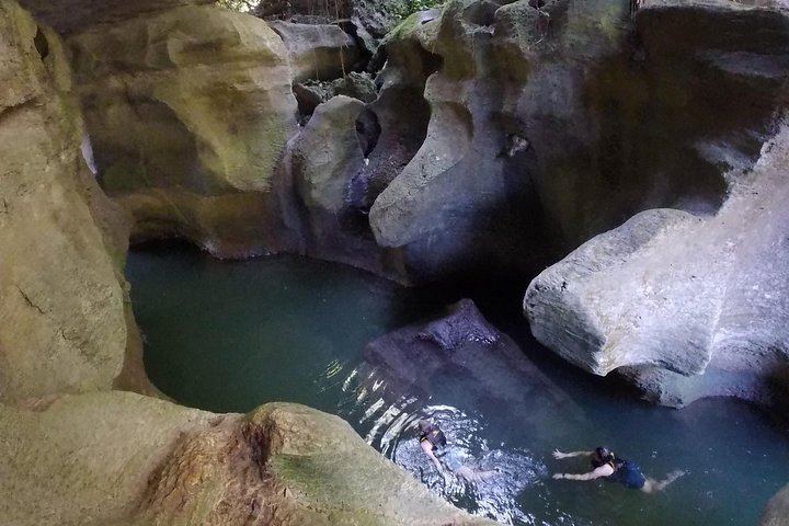 Arenales Caves, Taíno Petroglyphs and Charco Azul Pool with Optional Cliff Jumps (4/12)