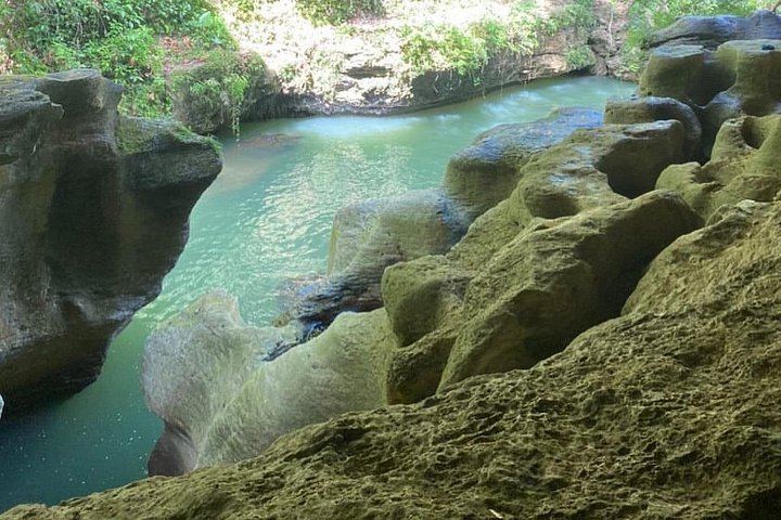 Charco Azul Cave, Waterfall and River Day Trip with 8 to 27 Foot Cliff Jumps (12/12)