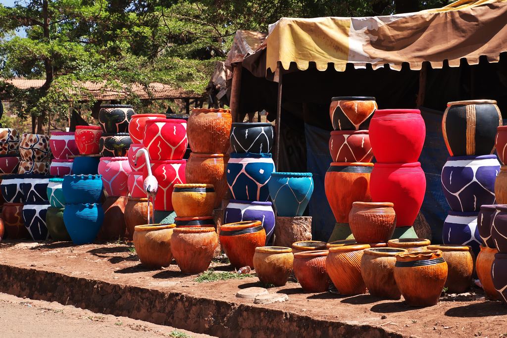 Stall of painted clay pots at a local market in Moshi, Tanzania