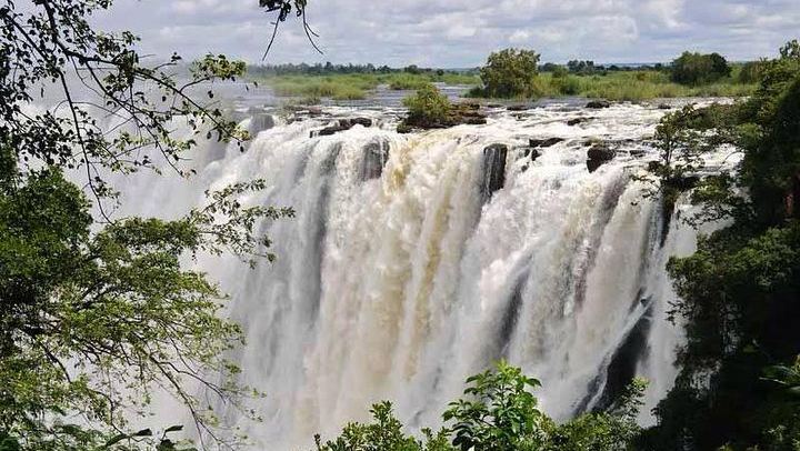 Victoria Falls Zambia Tour with Boiling Pot, Knife Edge Bridge, Snacks and Parking Fees (1/7)