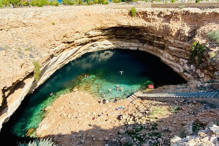 Small-Group Day from Muscat with Sunshine Tours Oman: Wadi Shab, Sinkhole, Fins Beach (6/7)