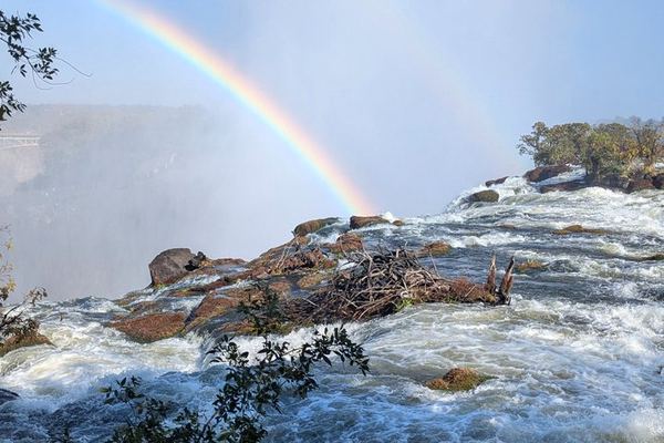 Slow-Paced Private Victoria Falls Day Across Zimbabwe, the Bridge and Zambia
