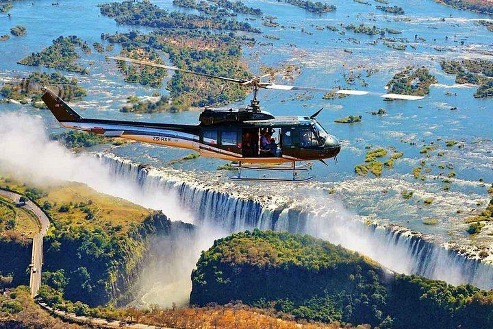 Victoria Falls Rainforest Guided Tour with Private Transport from the Hotel (9/11)