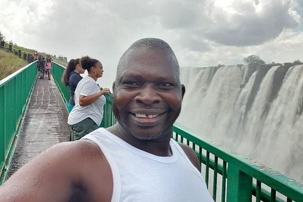 Victoria Falls Zambia Tour with Boiling Pot Descent and Victoria Falls Bridge Views