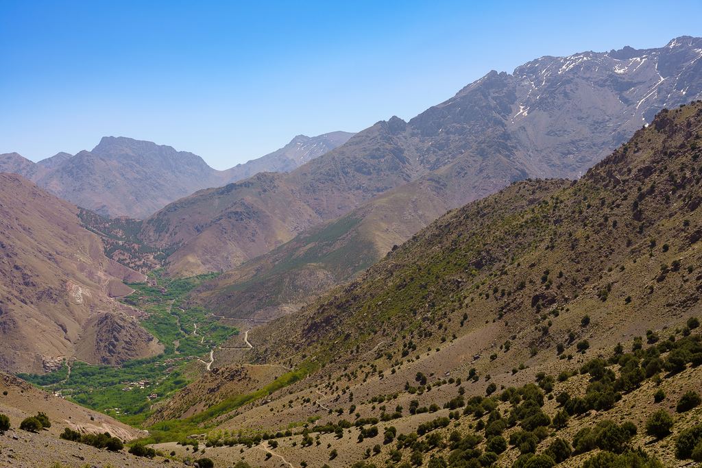 Valley in Morocco's High Atlas mountains with snow on the distant peaks