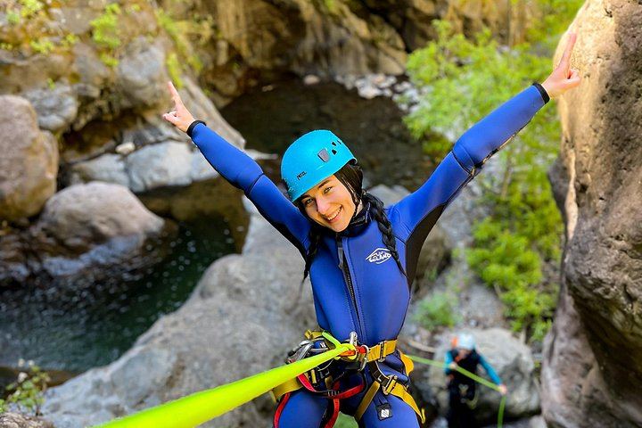 Intermediate Canyoning in Madeira: Rappel, Slide and Jump Down a Forest River (11/12)