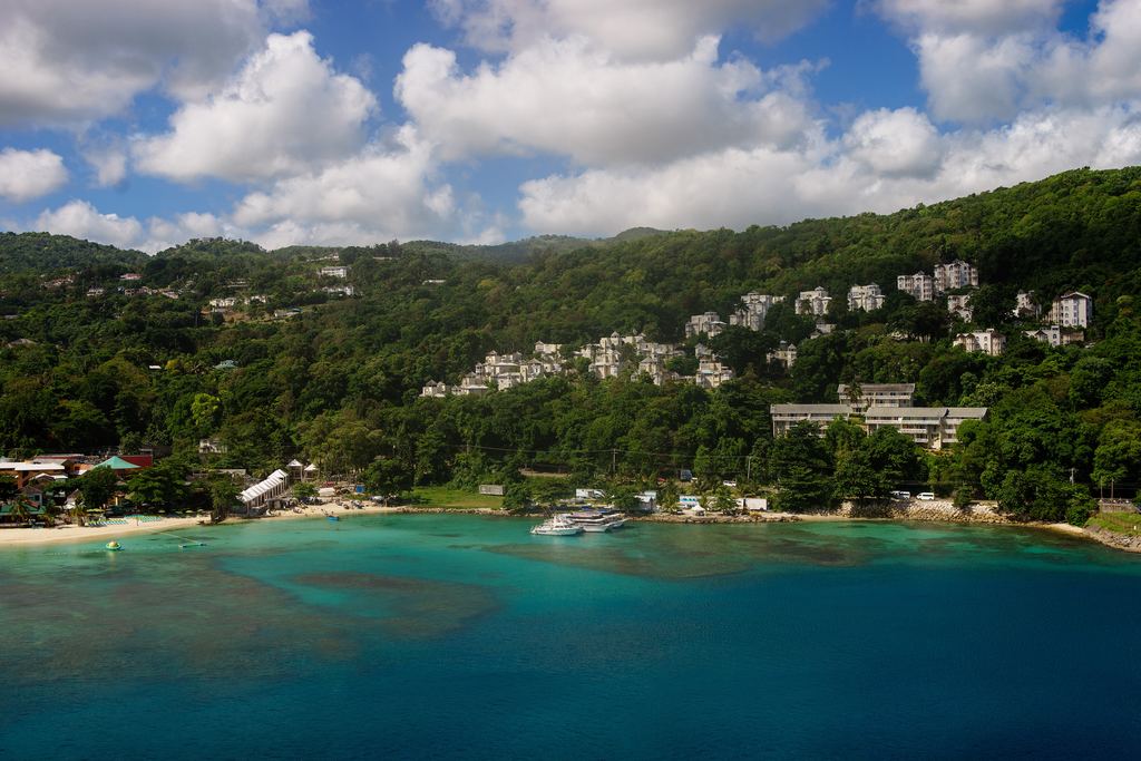 Green hills and a turquoise bay with boats near Ocho Rios, Jamaica