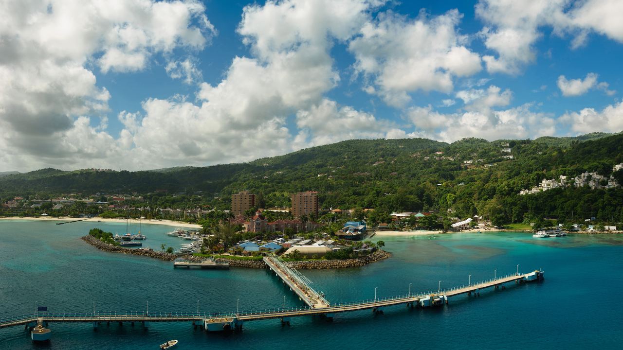 Cruise pier and green hills above the turquoise bay at Ocho Rios, Jamaica