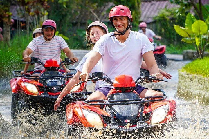 Ubud Quad Bike Ride with Tunnel, Waterfall and Ayung River Rafting Adventure (5/12)