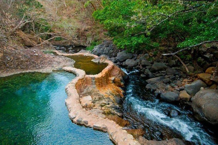 Oropendola Waterfall, Rio Negro Hot Springs and Mud Bath Day from Selected Hotels (7/9)