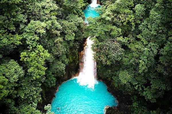 Rio Celeste Hike, Llanos de Cortes Falls and Sloth Sanctuary from Tamarindo