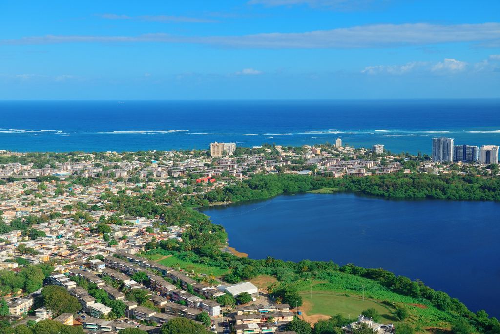 Aerial view of San Juan, Puerto Rico, with a lagoon, the city and the ocean beyond