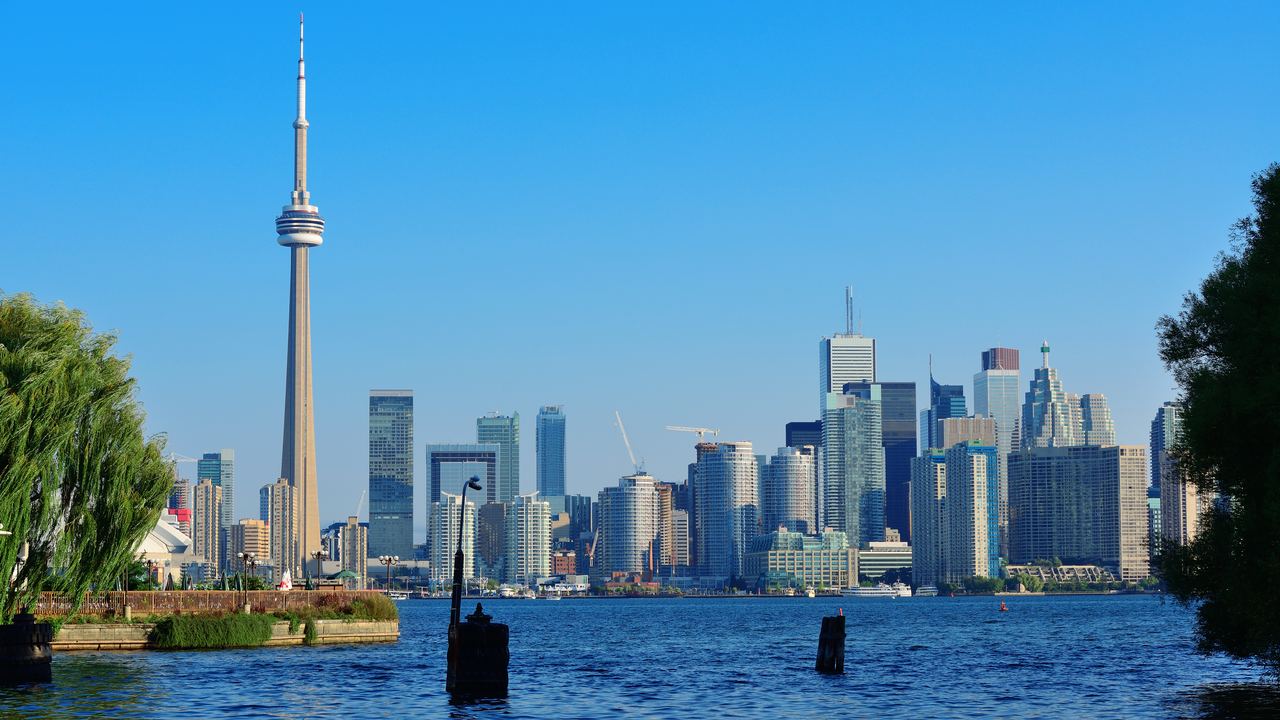Toronto skyline with the CN Tower seen across the water from the harbor islands