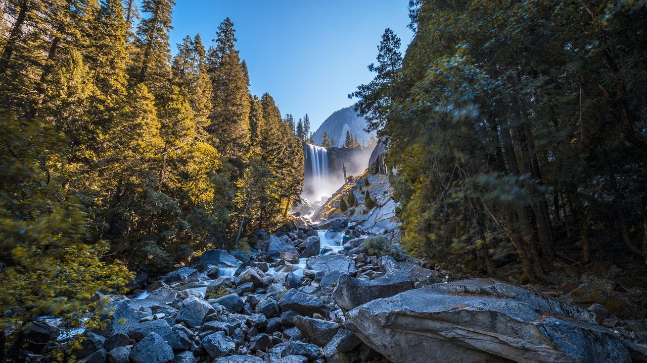 Vernal Falls seen across a boulder field in Yosemite National Park, California