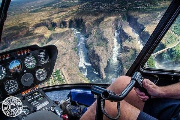 Victoria Falls 13 Minute Helicopter Tour with Bottled Water, Hotel Pickup and Park Helipad