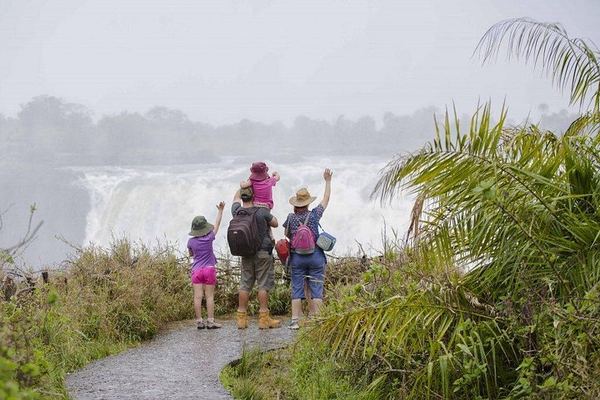 Victoria Falls Guided Tour from Livingstone with Bottled Water and Rainforest Views