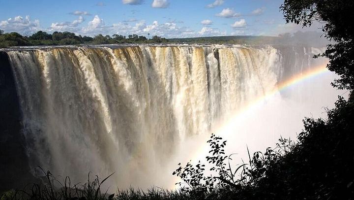 Victoria Falls Guided Tour from Livingstone with Bottled Water and Rainforest Views (4/9)