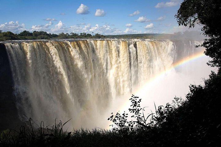 Victoria Falls Guided Tour from Livingstone with Bottled Water and Rainforest Views (4/9)