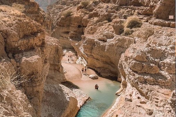 Small-Group Wadi Shab Day from Muscat: Hidden Waterfall Cave Swim and Bimmah Sinkhole