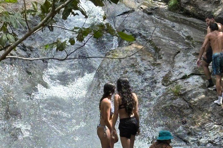 El Yunque River Pools, Big Waterslide and Beach Day Trip by Van from San Juan (4/12)