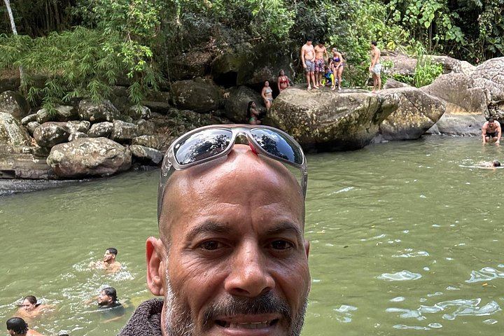 El Yunque River Pools, Big Waterslide and Beach Day Trip by Van from San Juan (6/12)