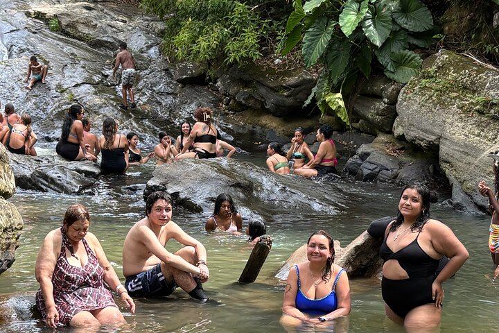 El Yunque River Pools, Big Waterslide and Beach Day Trip by Van from San Juan (3/12)