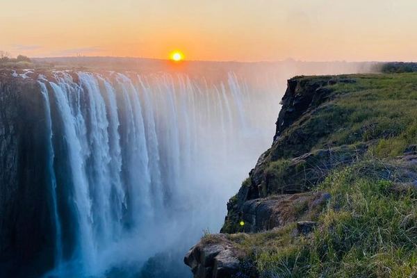 Six-Hour Victoria Falls Guided Tour Across Zimbabwe and Zambia with Hotel Transfers
